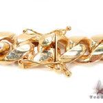 10k yellow gold solid Miami Cuban link chain, 15.5mm wide, polished finish.