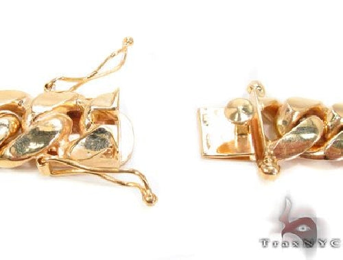 10k yellow gold solid Miami Cuban link chain, 15.5mm wide, polished finish.