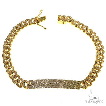 Yellow gold Miami Cuban link bracelet with micro pave diamond plate ID centerpiece, 7 inches.