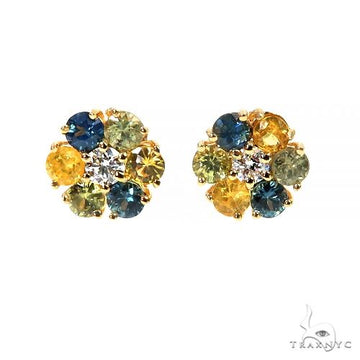 Mini cluster flower stud earrings with blue, yellow, and clear gemstones in yellow gold.