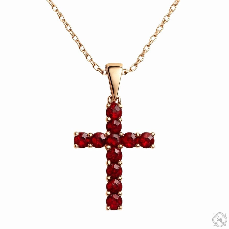 Mini blood red sapphire cross pendant set in rose gold with delicate chain