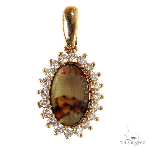 Yellow gold oval pendant with custom photo center surrounded by small diamonds