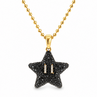 14k yellow gold Mini Mario Star black diamond pendant set, front view on diamond-cut bead chain