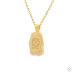 14K yellow gold mini Pharaoh pendant with detailed face and chain necklace.