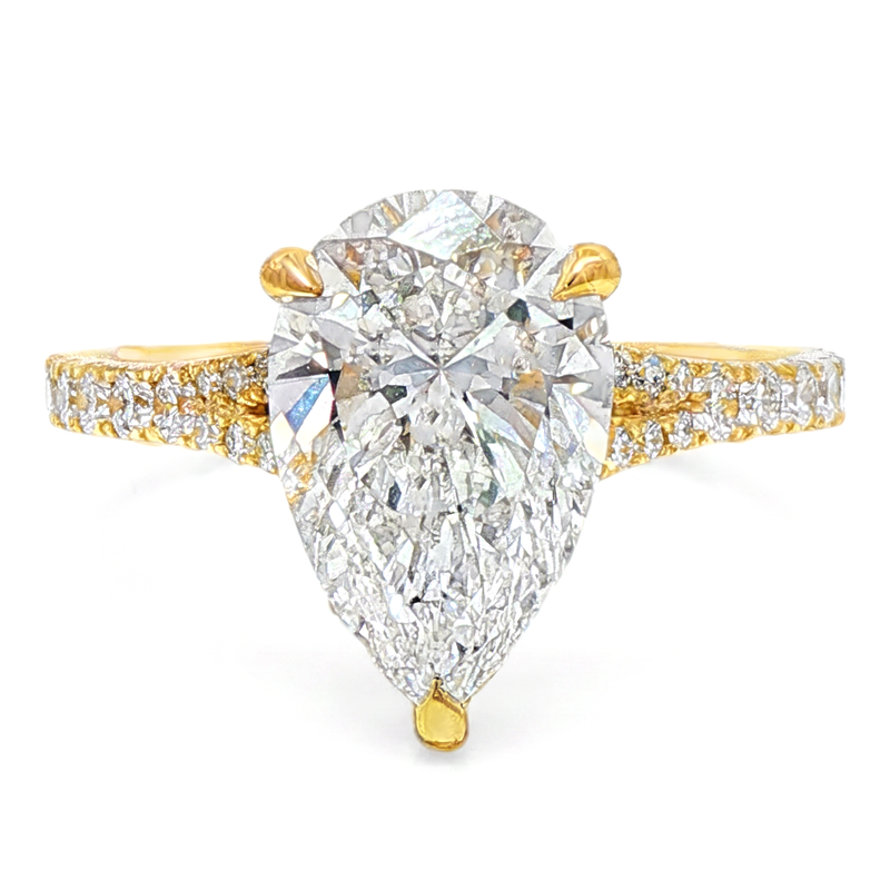 Pear cut 3 carat diamond engagement ring in a three-prong setting