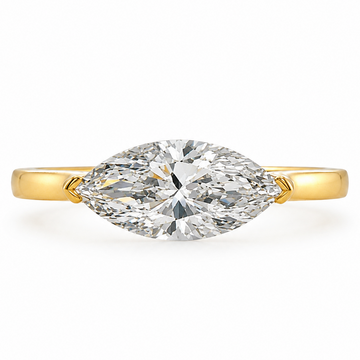 East-west marquise diamond ring with floating horizontal setting on a 14K yellow gold band