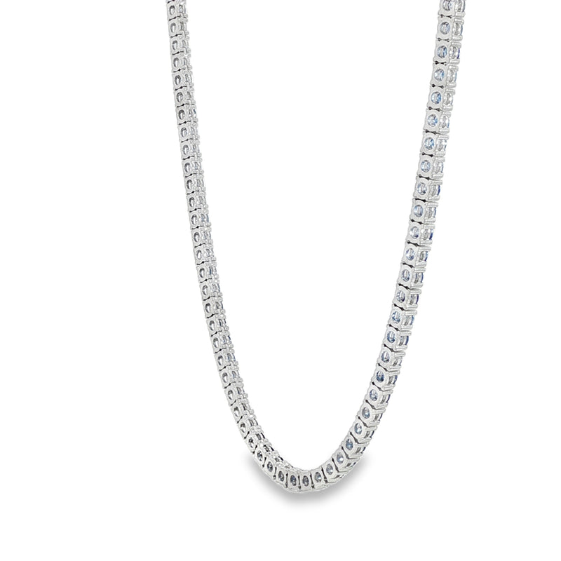 White gold tennis chain necklace with round blue sapphire gemstones, elegant and classic design.