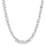 White gold diamond tennis chain with multi-shaped stones in a continuous link design.