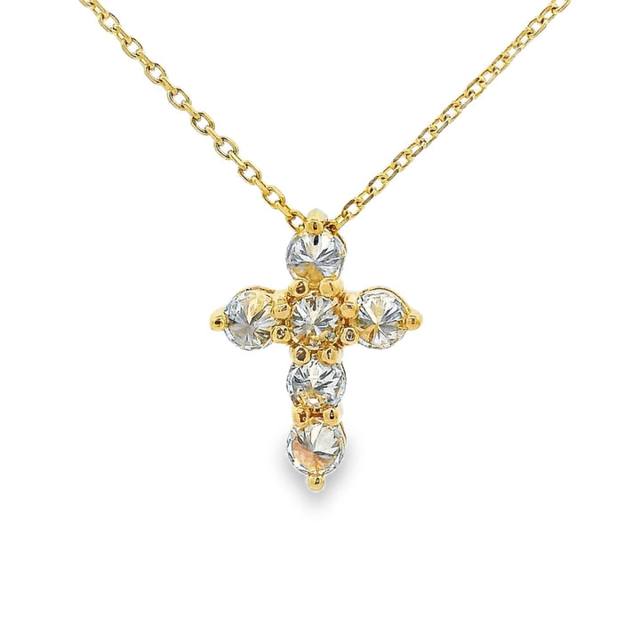 Yellow gold upside-down cross necklace with clear and yellow diamonds in a cluster design.