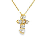 Yellow gold upside-down cross necklace with clear and yellow diamonds in a cluster design.