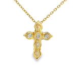 Yellow gold upside-down cross necklace with clear and yellow diamonds in a cluster design.