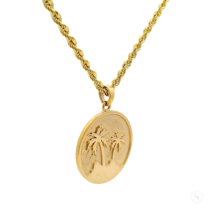 14K yellow gold pendant with palm tree oasis design on rope chain necklace.