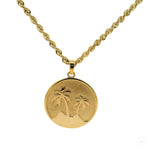 14K yellow gold pendant with palm tree oasis design on rope chain necklace.