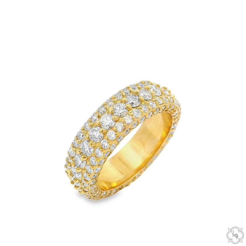 Yellow gold eternity band with multiple rows of round natural diamonds