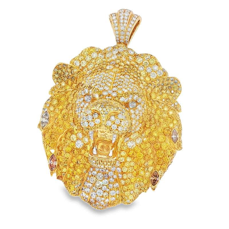 Gold lion head pendant encrusted with white and yellow diamonds, detailed mane and face.