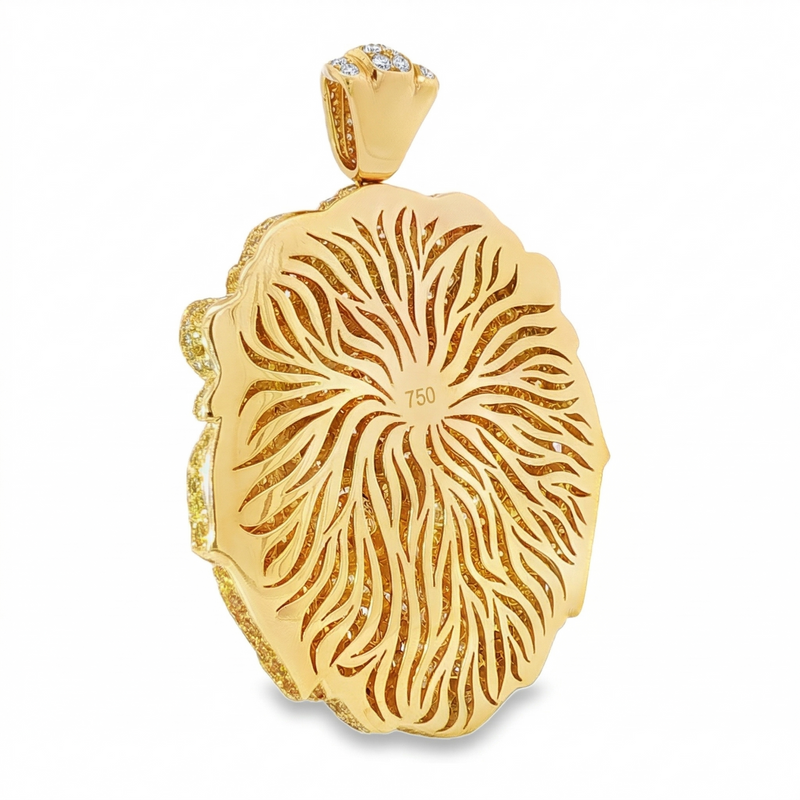 Gold lion head pendant with detailed mane engraving and diamond accents on bail.