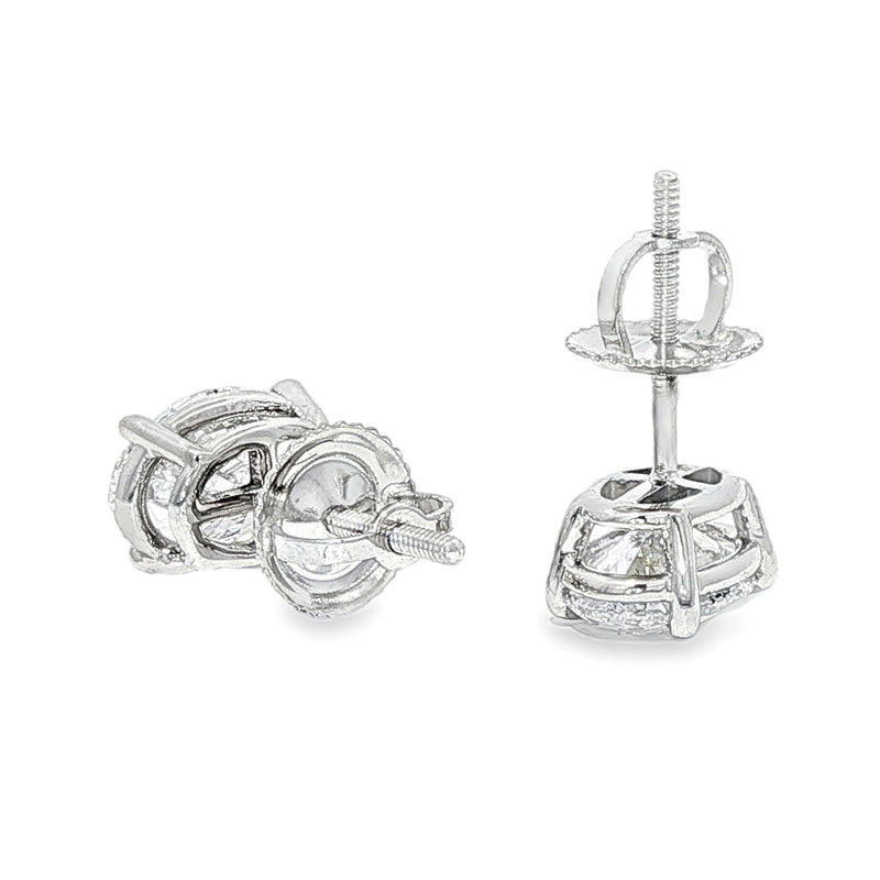 Pair of oval diamond stud earrings with cluster setting in white gold prong mount