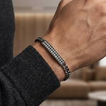 Oxidized silver men's bracelet with 6mm diamond-studded rectangular centerpiece.