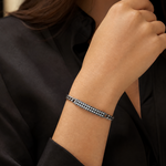 Oxidized silver men's bracelet featuring 6mm sparkling diamond accents on wrist.
