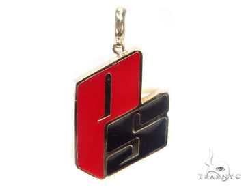 PS monogram gold pendant, front-facing view showing letter detailing and bail