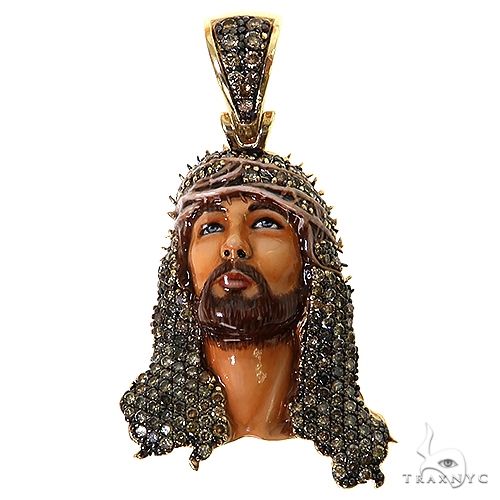 Yellow gold pendant featuring a detailed Jesus head with black and champagne diamonds