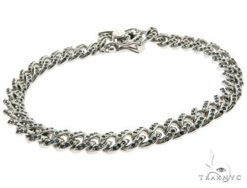 Men's pave diamond bracelet in gold – closely set stones running full length, front view