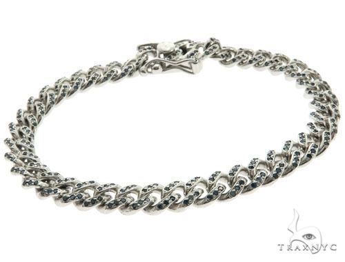Men's pave diamond bracelet in gold – closely set stones running full length, front view