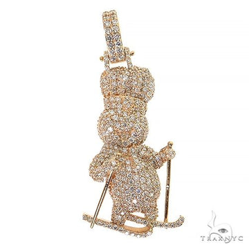 Yellow gold Pillsbury Dough Boy pendant with diamonds, holding skis and poles, men's jewelry.