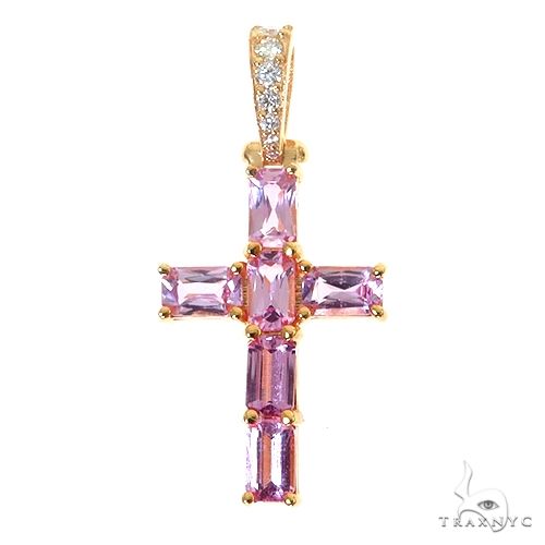 Yellow gold cross pendant with pink emerald-cut sapphire gemstones and diamond accents