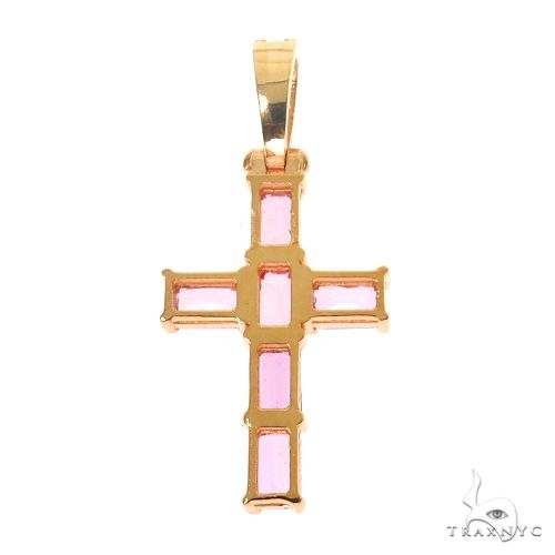 Rose gold cross pendant with pink emerald-cut sapphire gemstones