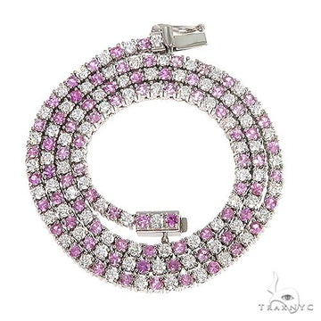 Pink sapphire and diamond tennis chain necklace in rose gold setting, elegant clasp detail.