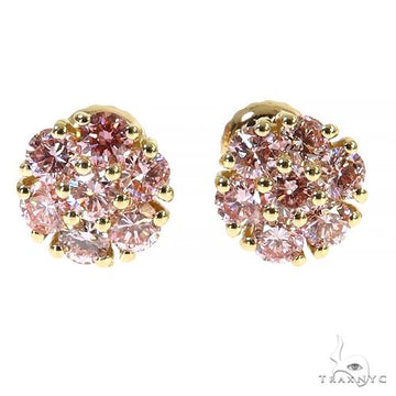 Gold cluster earrings with pink diamond flower-shaped gemstones.