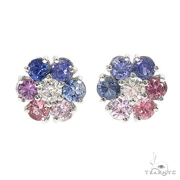 Large flower cluster earrings with pink, blue sapphires and central diamonds, white metal setting.