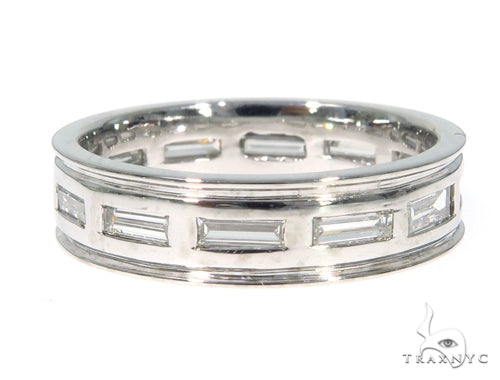 Platinum men's band with rectangular emerald-cut diamonds set in a geometric pattern