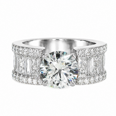 Platinum engagement ring with round center diamond and baguette side diamonds in halo setting.