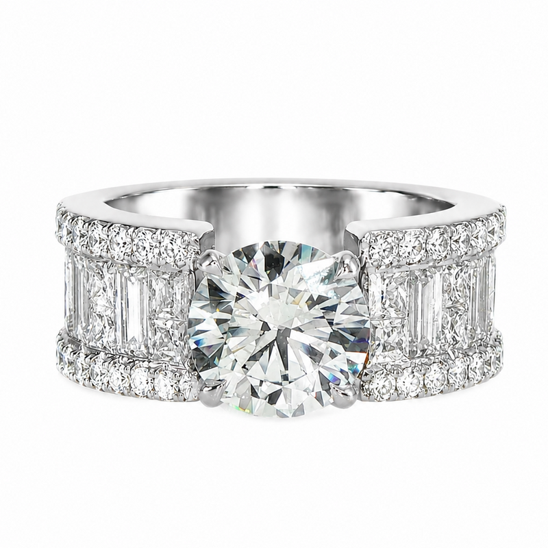 Platinum engagement ring with round center diamond and baguette side diamonds in halo setting.