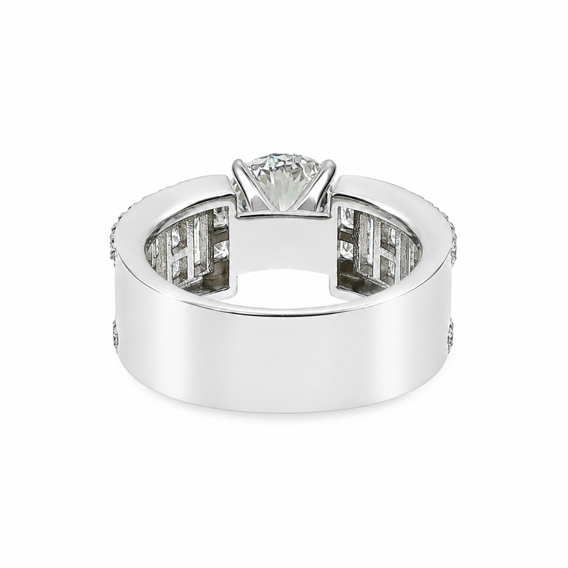 White gold princess-cut diamond engagement ring with baguette side stones, polished band.