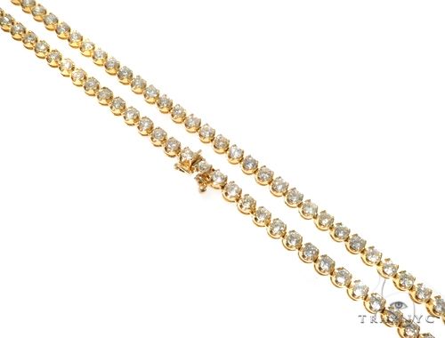 Prong set diamond chain, 6mm wide 30 inches, round-cut stones in individual prong settings, front-facing view