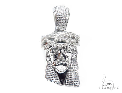 White gold Jesus pendant with prong-set diamonds and detailed facial design
