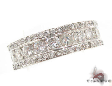 White gold custom eternity band with three channel-set rows of round diamonds