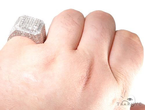 Wide white gold men's ring with multiple prong-set sparkling diamonds