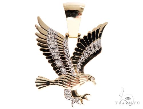 Yellow gold eagle pendant with diamond accents and detailed wing design