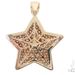 Yellow gold star pendant encrusted with diamonds and red gemstone eyes, men's jewelry.