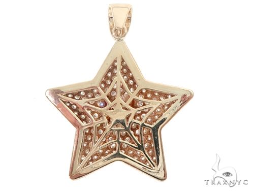 Yellow gold star pendant encrusted with diamonds and red gemstone eyes, men's jewelry.
