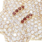 Yellow gold star pendant encrusted with diamonds and red gemstone eyes, men's jewelry.