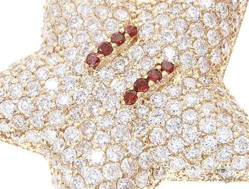 Yellow gold star pendant encrusted with diamonds and red gemstone eyes, men's jewelry.