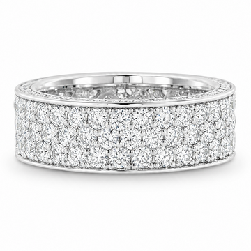 Prong diamond eternity ring in yellow gold – round-cut diamonds set around full band, wide profile, top-down angle