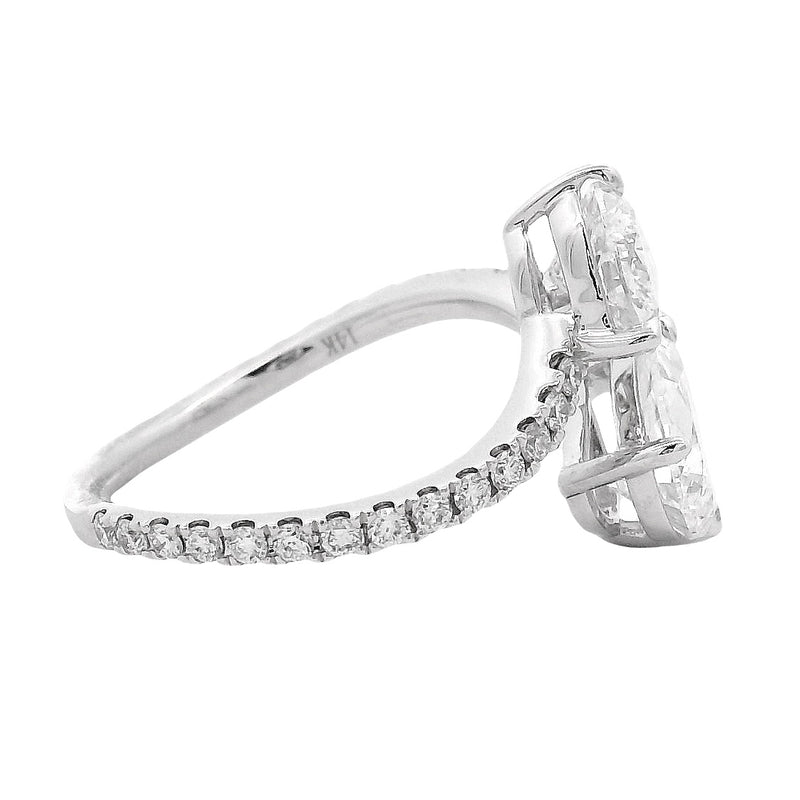 Diamond ring with a heart-shaped center stone