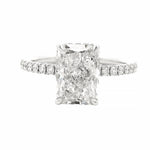 Radiant Diamond Engagement Ring in 14K gold with 2 carat radiant-cut lab grown diamond, hidden halo, and pavé diamond band