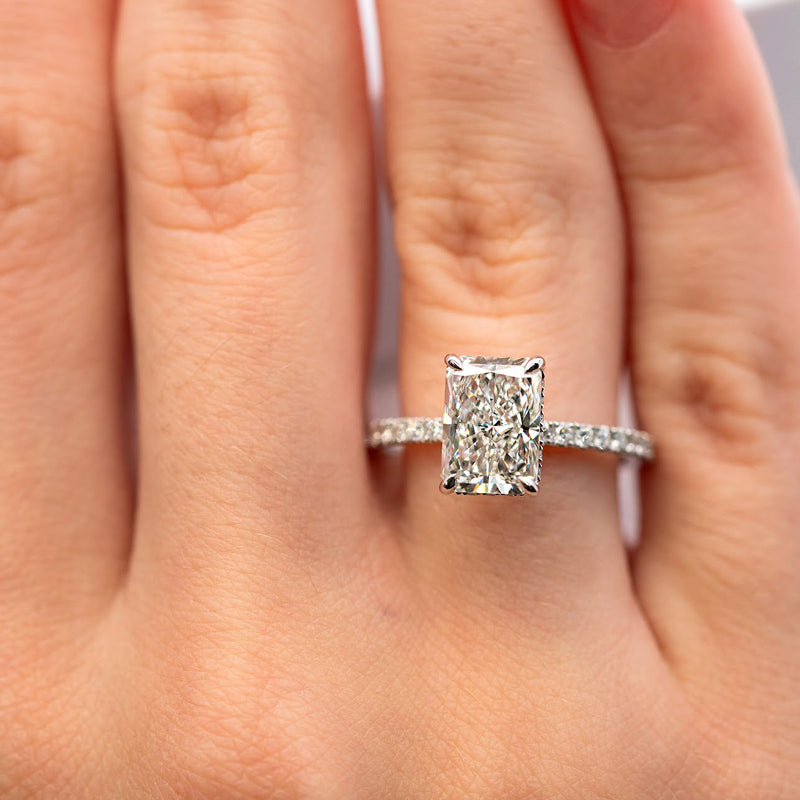 Radiant Diamond Engagement Ring in 14K gold with 2 carat radiant-cut lab grown diamond, hidden halo, and pavé diamond band
